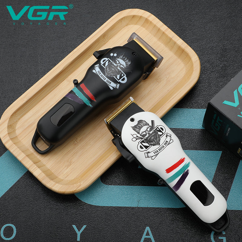 VGR V-699 – Dispositivo multifunzione con 5 testine intercambiabili per barba, capelli e peli del corpo. Include lame in acciaio inox, una autonomia di 120 minuti, e ricarica USB rapida per la massima praticità.